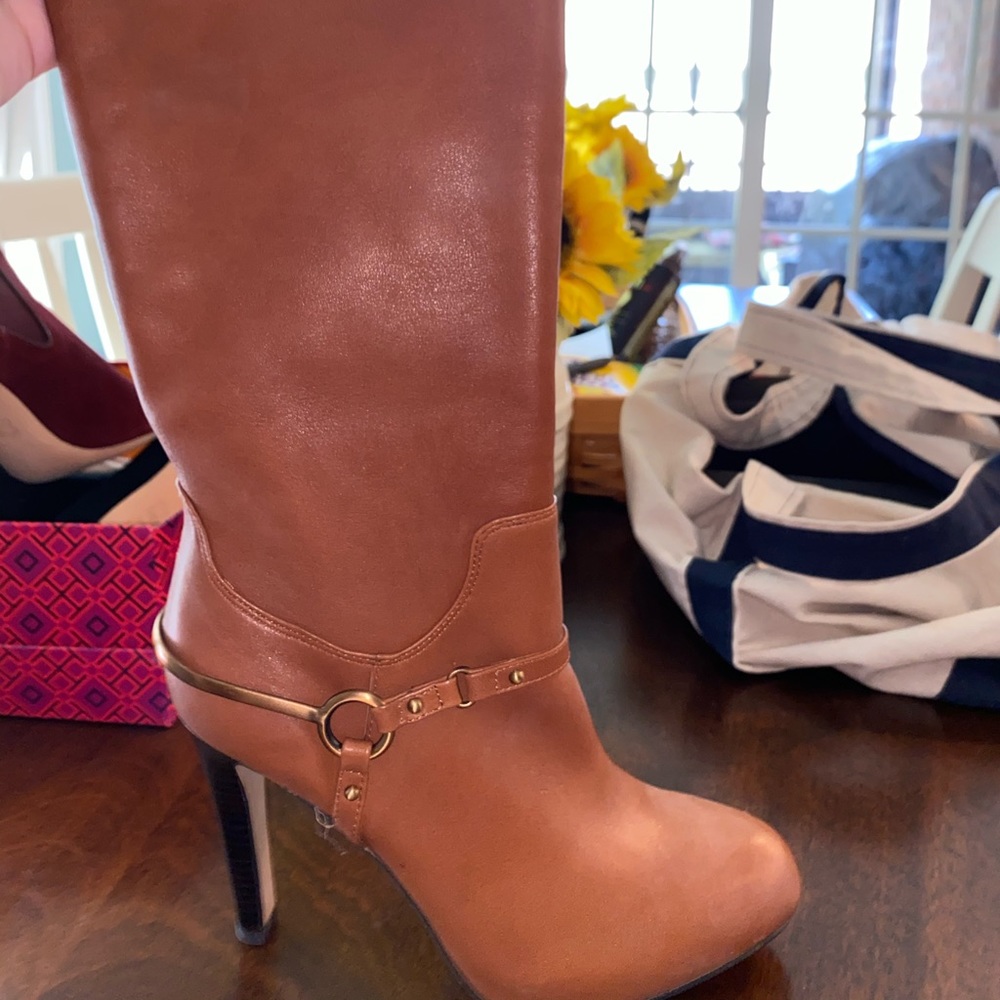Tall brown heeled boots